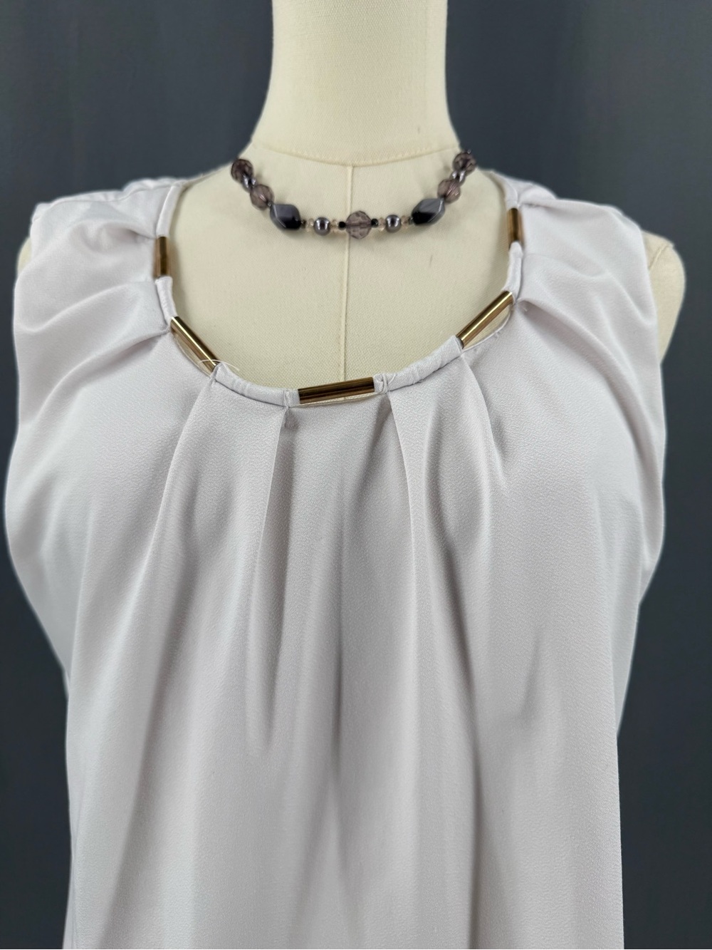 Passport White Sleeveless Pleated Top with Gold-Tone Neck Accents